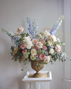 Pastel wedding flowers 
Wedding urn arrangement 
Whimsical wedding flowers 
Classic wedding flowers English Floral Arrangements, Parisian Flower Arrangements, Asymmetrical Flower Arrangements, Vintage Floral Arrangements Wedding, Baroque Floral Arrangement, Extravagant Flower Arrangements, French Style Flower Arrangements, Fairytale Floral Arrangements, Bridgerton Floral Arrangements