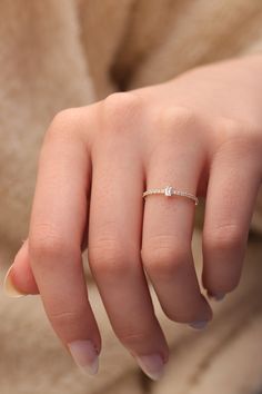 "14k & 18k Baguette Diamond Band / Half Eternity Baguette Diamond Ring / Gold Diamond Minimalist Ring Available in Gold,Rose Gold,White Gold ❥ ITEM DETAILS ---> Gold Color of Choice : Yellow Gold, Rose Gold, White Gold ---> Material : 14k ( 585 ) or 18k ( 750 ) Real Gold. It is Not Gold Filled or Gold Plated ---> Made to order ---> Band Thickness : 1.25 mm ---> Band Width : 1.20 mm ---> Clarity : H color VS/SI ---> Diamond Cut: Round & Baguette ---> Number of Ston Elegant Everyday Diamond Ring With Baguette Diamonds, Minimalist Baguette Cubic Zirconia Jewelry, Elegant Everyday Emerald Cut Diamond Ring, Dainty Baguette Jewelry For Everyday, Baguette Rings For Gift, Rose Gold Diamond Ring With Baguette Diamonds, Rose Gold 14k Gold Rings With Baguette Diamonds, Everyday 14k Gold Rings With Baguette Diamonds, Rose Gold 14k Baguette Diamond Rings