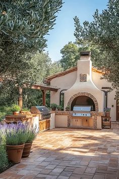 Outdoor kitchen with a grill, tiled backsplash, and surrounding garden. Simple Outdoor Kitchen, Concrete Outdoor Kitchen, Covered Outdoor Kitchens, Rustic Inspiration, Outdoor Kitchen Ideas, Cozy Patio