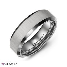 a men's wedding band with the words engale here engraved on it in stainless steel