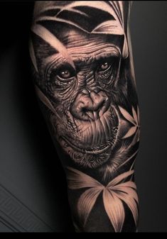 a man's arm with an image of a monkey on it