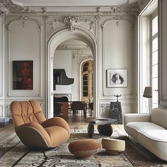 a living room filled with lots of furniture next to a piano and table in front of a doorway