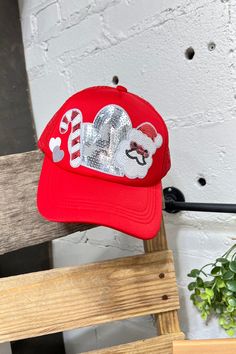 Women's Trucker Hat Details Trucker Style Hat Red Netting at Back Adjustable Tab Sequin Santa/Candy Cane/Heart Patch Shipping Packages typically ship within 1-3 business days after you place your order, with free shipping on all eligible orders. We’d love to see you in our Jasper, Alabama location, so please stop on by! To be the first to see our newest arrivals, don't forget to join our amazing and fun Facebook Community! You can also find our New Arrivals here in the shop, and don’t forget to Casual Holiday Hat With Curved Brim, Adjustable Casual Hats For Holiday, Casual Curved Brim Holiday Hat, Casual Curved Brim Hats For Holiday, Casual Curved Brim Hat For Holidays, Playful Adjustable Red Hat, Novelty Red Cap Hat, Fun Red Hat, One Size Fits Most, Novelty Red Baseball Cap