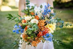 Fall wedding flowers with blue, orange, green