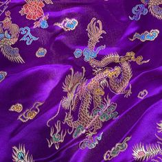 purple silk with dragon and flowers on it