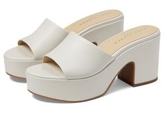 Marc Fisher LTD Forina - Women's Sandals : Ivory Leather2 : Sow seeds of timeless style wearing the Marc Fisher LTD Forina Sandals. The slip-on footwear features leather upper construction with chunky block heels and front platform for maximum support. Man-made lining and cushioned footbed. Open almond toe silhouette. Synthetic rubber outsole. Imported. Measurements: Heel Height: 3 1 7 in Weight: 1 lb Platform Height: 1 9 13 in Product measurements were taken using size 7, width M. Please note that measurements may vary by size. White Non-slip Open Toe Platform Slippers, White Open Toe Chunky Platform Sandals, White Open Toe Platform Mules, White Open Toe T-strap Sandals With Leather Sole, Marc Fisher Sandals, Chunky Block Heels, Marc Fisher, Synthetic Rubber, Women's Sandals