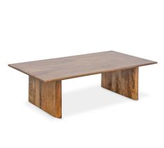 a wooden table sitting on top of a white floor