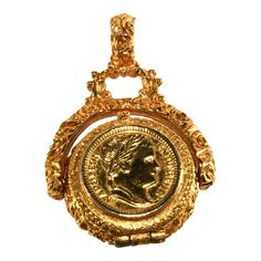 This is part of Chairish’s Costume Jewelry assortment.  Unique spinner pendant with the Emperor Napoleon on one side and another symbol used by Goldette on the other. This brings to mind older watch fobs in its styling. The top opens like a locket. Metal is gold plated. Could be worn on your favorite thick chain, cord or ribbon (not included). We believe this piece dates to the 1960s. Marked Goldette inside. Measure about 2 1/4" inches long including the bail and around 1 1/2" wide. Condition is Vintage Medallion Locket Necklace With Coin Pendant, Vintage Medallion Coin Pendant Jewelry, Antique Coin Pendant Locket Necklace, Antique Locket Necklace With Coin Pendant, Antique Round Coin Pendant Locket Necklace, Amulet Style Medallion Locket Necklace With Detachable Pendant, Antique Brass Medallion-style Pocket Watch, Vintage Medallion Jewelry With Detachable Pendant, Antique Gold Pocket Watch With Vintage Charm