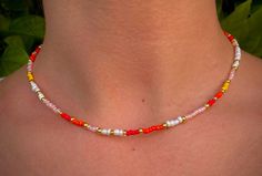 The Sunset Necklace! Necklace is 15 inches long with an 1 inch sterling silver adjustable extender chain. Multicolor Beaded Necklace With Adjustable Length As Gift, Multicolor Adjustable Beaded Necklace Gift, Multicolor Beaded Necklace With Adjustable Length, Sunset Necklace, Colorful Choker, Choker Handmade, Necklace Orange, Handmade Chokers, Orange Necklace