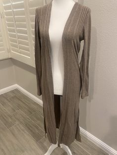 Casual long sleeve cardigan. 97% rayon 3% spandex Trendy Long Sleeve Shrug For Spring, Elegant Soft Knit Long Sleeve Cardigan, Fitted Soft Knit V-neck Cardigan, Stretch Knit Long Sleeve Outerwear, Chic Stretch Shrug For Fall, Stretch Knit Outerwear With Long Sleeves, Trendy Long Sleeve Stretch Shrug, Fitted V-neck Sweater Coat For Spring, Fitted V-neck Soft Knit Cardigan