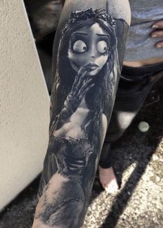 a woman's arm with a tattoo on it