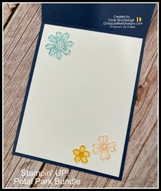 a close up of a card with flowers on it