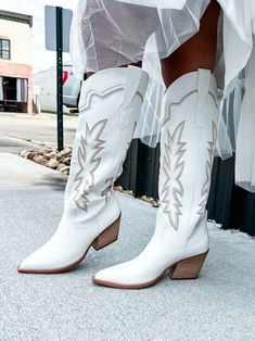 Upgrade your western-inspired style with INDIGO cowgirl boots. With detailed stitching and a touch of fabulousness, these boots will elevate any outfit. Don't settle for basic, shop from the best of the best and keep them guessing with your new favorite boots. Yeehaw!