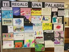 a bulletin board is covered with posters and other items for the school's art project