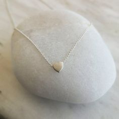 A romantic necklace for Valentine's DAY! ✔️Sterling Silver 925 ✔️ A Minimalist Necklace with an extra tiny heart pendant. With a matt but shiny finish that makes it so unique! >> SIZE Chain Lenght alternatives👉12 - 13 -14-15- 16-17-18-19-20 inches ( 30 -33 -35-38- 40-42- 45-48 -51 cm). I add a chain extension of + 1.inch (3 cm). So you can adjust the length as you wish. The diameter of the heart pendant is 0.25 inches 0.5cm >> IS IT A GIFT? This heart Necklace comes in a beautiful g Simple Heart Pendant Necklace For Everyday, Minimalist Heart Charm Necklace For Valentine's Day, Minimalist Heart Charm Necklace With Heart Beads, Minimalist Necklace With Heart Pendant And Beads, Minimalist Heart Pendant Necklace With Heart Beads, Minimalist Necklace With Open Heart And Heart Beads, Minimalist Delicate Chain Charm Necklace For Valentine's Day, Minimalist Open Heart Necklace With Heart Beads, Minimalist Necklace With Heart Pendant Detail