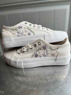 Hand embroidered floral sneakers. Perfect for a wedding, bachelorette, bridal shower, or for an every day sneaker with a little flare! Embroidered Wedding Sneakers, Casual Sneakers With Custom Embroidery For Spring, Spring Lace-up Sneakers With Embroidered Logo, Casual Sneakers With Floral Applique For Spring, Spring Casual Sneakers With Floral Applique, Casual Floral Applique Sneakers For Spring, Spring Floral Embroidered Round Toe Sneakers, Spring Wedding Sneakers With Round Toe, Spring Wedding Embroidered Sneakers