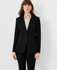 Elevate your professional wardrobe with the Ann Taylor Long One-Button Blazer in Bi-Stretch, a perfect blend of style and comfort. This blazer is meticulously designed to maintain its shape and enhance yours, ensuring you look polished from morning to evening.

- **Size:** 00 Regular
- **Color:** Black
- **Material:** 66% Polyester, 28% Rayon, 6% Spandex
- **Gender:** Female
- **Features:** Peaked lapel, one-button front, long button-open sleeves, front besom pockets, back vent, lined
- **Care I Petite Suits, Knitted Suit, Women's Blazers, Professional Wardrobe, Womens Blazers, Suit Separates, Blazer Buttons, Black Blazer, Black Blazers