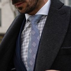 I’ve always been drawn to classic designs, and our glen plaid silk tie, known as Principe di Galles in Italian, is a perfect example. The woven pattern in white and blue captures the essence of timeless sophistication and adds a touch of refined elegance to any outfit. It’s a piece that truly embodies classic style. Details Standard Length: Approx. 3.25" x 58.5" (8 x 149cm). A classic tie width and length that is perfect for most men up to 6'2" (188cm). Extra Long Length: Approx. 3.38" x 62.5" ( Blue Tailored Ties For Business, Tailored Blue Formal Tie, Tailored Timeless Suit And Tie Accessories, Timeless Blue Suit And Tie Accessories For Formal Occasions, Timeless Suit And Tie Accessories For Business, Timeless Business Suit And Standard Tie Accessories, Elegant White Ties For Workwear, Elegant White Ties For Work, Elegant Fitted Plaid Ties