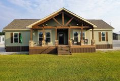 a small house with porch and covered front porch