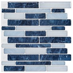 blue and white marble mosaic tile with silver trims on the bottom half of it