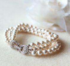 Pearl Bridal Bracelet,Pearl Wedding Bracelet,Three Strand Swarovski Crystal Pearl Bracelet,Pearl Bridal Jewelry B102 by DreamIslandJewellery #pearlbracelet #bracelets #weddingjewelry #bridaljewelry Swarovski Pearls Bracelet, Bridesmaid Bracelet Gift, Macrame Colar, Bridal Bracelet Pearl, Pearl Bracelet Wedding, Pearl Jewelry Wedding, Bracelet Pearl