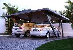 two cars parked under a covered parking lot