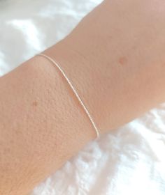 Dainty Sterling silver 925 bracelet, simple thin stacking bracelet, super thin silver chain bracelet, delicate bracelets, simple  ⇒ MATERIALS Sterling silver.  ⇒ PACKAGING All orders are carefully packaged in a lovely box ready for gift giving, and shipped in a bubble envelope. Please read all my shop policies before purchasing: https://www.etsy.com/shop/turinn#policies Go back to my Shop: https://www.etsy.com/shop/Turinn Dainty Sterling silver 925 bracelet, simple thin stacking bracelet, super thin silver chain bracelet, delicate bracelets, simple Dainty Silver Bracelets, Simple Silver Bracelet, Dainty Jewelry Silver, Bracelets Simple, Silver Packaging, Winter Ball, Bracelet Simple, Silver Chain Bracelet, Dainty Jewelry