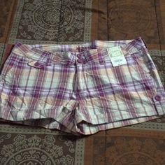 Purple/Soft Orange/White Plaid Shorts Waist Is 19" Wide Shorts Are 11" Long 2.5" Inseam Summer Cotton Bottoms In Purple, Purple Cotton Shorts With Pockets, Summer Cotton Purple Bottoms, Purple Cotton Summer Bottoms, Summer Purple Cotton Bottoms, Purple Cotton Bottoms Short Length, Purple Cotton Short Bottoms, Casual Purple Cotton Shorts, Purple Fitted Cotton Shorts