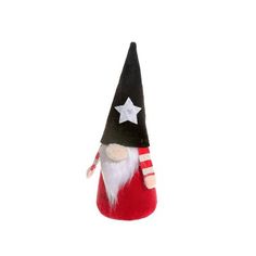 a small red and black gnome with a star on his hat is hanging from the ceiling