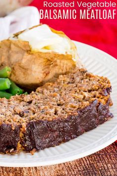 a plate with meatloaf, mashed potatoes and green beans