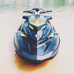 a blue and black jet ski in the water