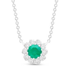 The Lila necklace is a magnificent expression of beauty, destined to captivate attention. Its arrangement of emerald and diamonds in a flower-like design exudes unparalleled brilliance, reflecting the allure of natural beauty and glamour. Each element of the necklace is meticulously crafted to evoke a sense of elegance and sophistication, making it a standout piece in any collection. SKU BS30459P EMERALD SIZE 5mm COLORSTONE SHAPE Round COLORSTONE WT 0.60cts DIAMOND WT 0.30cts Ethically sourced emeralds directly from our renowned Belmont mine in Brazil. Formal Emerald Necklaces With Single Cut Diamonds, Dazzling Round Emerald Necklace, Fine Jewelry Emerald Necklaces With Diamond Accents, Green Necklace With Single Cut Diamonds For Anniversary, Anniversary Green Necklace With Single Cut Diamonds, Diamond Gemstone Necklace With Flower Pendant, Green Diamond Round Cut Necklaces, Elegant May Birthstone Necklaces With Prong Setting, Elegant May Birthstone Necklace With Prong Setting