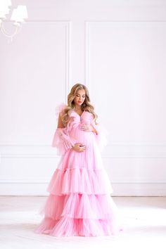 "💖 Luxurious Pink Tulle Phot Shoot Dress - the perfect choice for maternity photoshoot. This Pink Maternity Dress features a beautiful full-length design with an abundance of ruffles and layers, creating a truly charming and feminine look. Rose Unique Plus Size Dress, Full Length Dress Pink, Tulle Long Sleeve Dress, Pregnancy Photoshoot Dress - all about our beautiful, universal dress that will fit any event, this dress made with love special for you! 💖 We take pride in offering bespoke tailor Tulle Dress With Ruffles For Bridal Shower, Pink Ruffled Maternity Dress, Pink Maternity Dress With Ruffles, Elegant Maternity Tulle Gown, Elegant Maternity Dress With Tulle Skirt, Elegant Tulle Maternity Gown, Pink Tulle Maternity Dress For Wedding, Elegant Pink Tulle Maternity Dress, Pink Maternity Gown For Spring