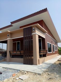 a house that is sitting in the dirt