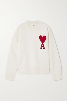 Alexandre Mattiussi's label, AMI Paris, was born in the City of Lights with each collection "blurring the boundaries between casual and chic". This 'ADC' sweater is intarsia-knitted from wool with the signature <i>Ami de Cœur</i> motif. Wear yours with tonal cargo pants - keeping casual outfits to a single color makes the look more refined.<br><br>This product supports best practice in Animal Welfare. Find out more about NET SUSTAIN <a href… Stile Blair Waldorf, Oversized Turtleneck, Paris Woman, Heart Sweater, Ami Paris, Stockholm Fashion, Mode Inspo, Dream Clothes, White Sweaters