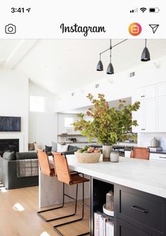 an open kitchen and living room are featured on the instagram page for ambieinttors