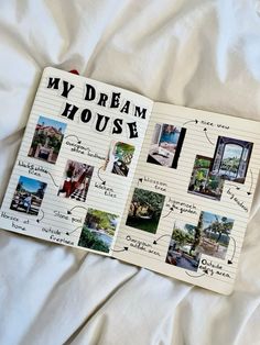 an open notebook with pictures on it sitting on top of a sheet of paper that says, my dream house