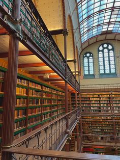 the interior of a large library with many bookshelves