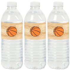 three bottles of water with basketball labels on the front and back of each bottle are shown