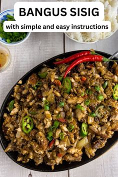 a pan filled with rice and vegetables on top of a table