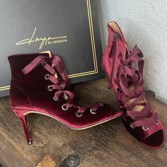 In New Excellent Condition And In Original Box. Deep Red All Velvet Open Toed Bootie Heels. Heel Is 3.5 Inches High. Full Lace Up On The Front. Shaft Is 4.5 Inches High. Heel Is Velvet As Well As The Toe Bed. Fitted Burgundy Heels For Evening, Burgundy Heels For Party, Fitted Burgundy Heels For Party, Burgundy Lace-up Heels, Burgundy Evening Heels For Fall, Zendaya Shoes, Bootie Heels, Favorite Shoes, Velvet Lace