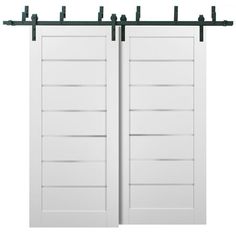 two white doors with black bars on each side