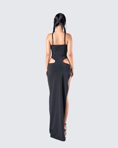 Carrie Black Cut Out Dress Black Maxi Dress With Cut-out Waist For Evening, Chic Bodycon Dress With Cut-out Waist For Date Night, Elegant Fitted Midi Dress With Cut-out Waist, Elegant Maxi Club Dress, Fitted Backless Dress With Side Slits For Night Out, Fitted Long Backless Dress For Night Out, Elegant Bodycon Dress With Cut-out Waist For Party, Flirty Fitted Dress With Cut-out Waist, Elegant Cut-out Waist Bodycon Dress For Date Night