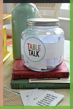 there is a jar on top of some books with the words table talk written in it