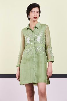 Green dress with embroidered floral motifs detail.
Components: 1
Fabric: Organza
Neckline: Shirt Collar
Sleeve Length: Full
Color: Green
Embroidered
3D floral embroidery
Front button placket - Aza Fashions Embroidered Organza Dress, Embroidered Loafers, Organza Shirt, Designer Gowns, Floral Motifs, Indian Design, Dress For Women, Shirt Collar, Embroidered Dress