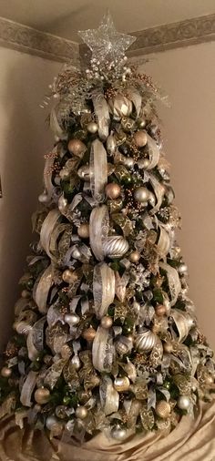 a decorated christmas tree with ornaments on it