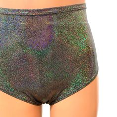 Our classic high waist hot pants with scrunch ruching detail in back to offer a "cheekier" look. These hot pants are made of stretchy gleaming silver holographic spandex and sit high on your natural waist. Wear as a bikini bathing suit bottom, panties, rave shorts, running shorts, etc. They have a built in liner and are made to be flattering to your figure. Fitted Metallic Shiny Bottoms, Metallic Stretch Disco Shorts, Disco Style Glitter Stretch Bottoms, Disco Style Stretch Glitter Bottoms, Fitted Shiny Metallic Bottoms, Metallic Shiny Bottoms For Club, Metallic Shiny Stretch Shorts, Metallic Shiny Stretch Bottoms, Silver Stretch Bottoms Short Length