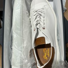 New In Box White And Brown Size 16 Casual White Golf Shoes With Contrast Sole, White Leather Golf Shoes With Plain Toe, Casual White Round Toe Golf Shoes, White Casual Golf Shoes With Round Toe, Casual White Golf Shoes With Round Toe, White Sneakers With Perforated Toe Box, White Golf Shoes With Textured Sole And Round Toe, White Golf Shoes With Textured Sole, White Leather Golf Shoes With Textured Sole