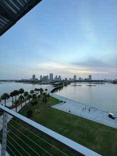 the view from an apartment balcony looking out on the water