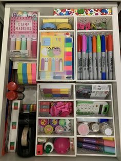 a drawer filled with lots of different types of crafting supplies